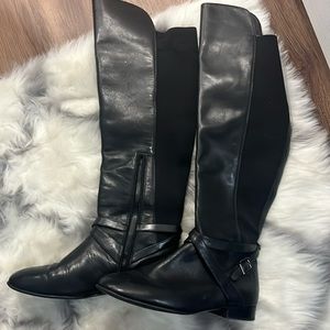 Beautiful black leather over the knee boot